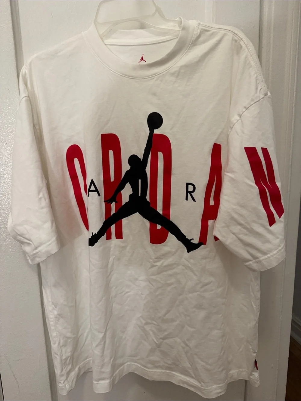 Jordan White Short Sleeve Tee with Red Lettering and Black Jumpman